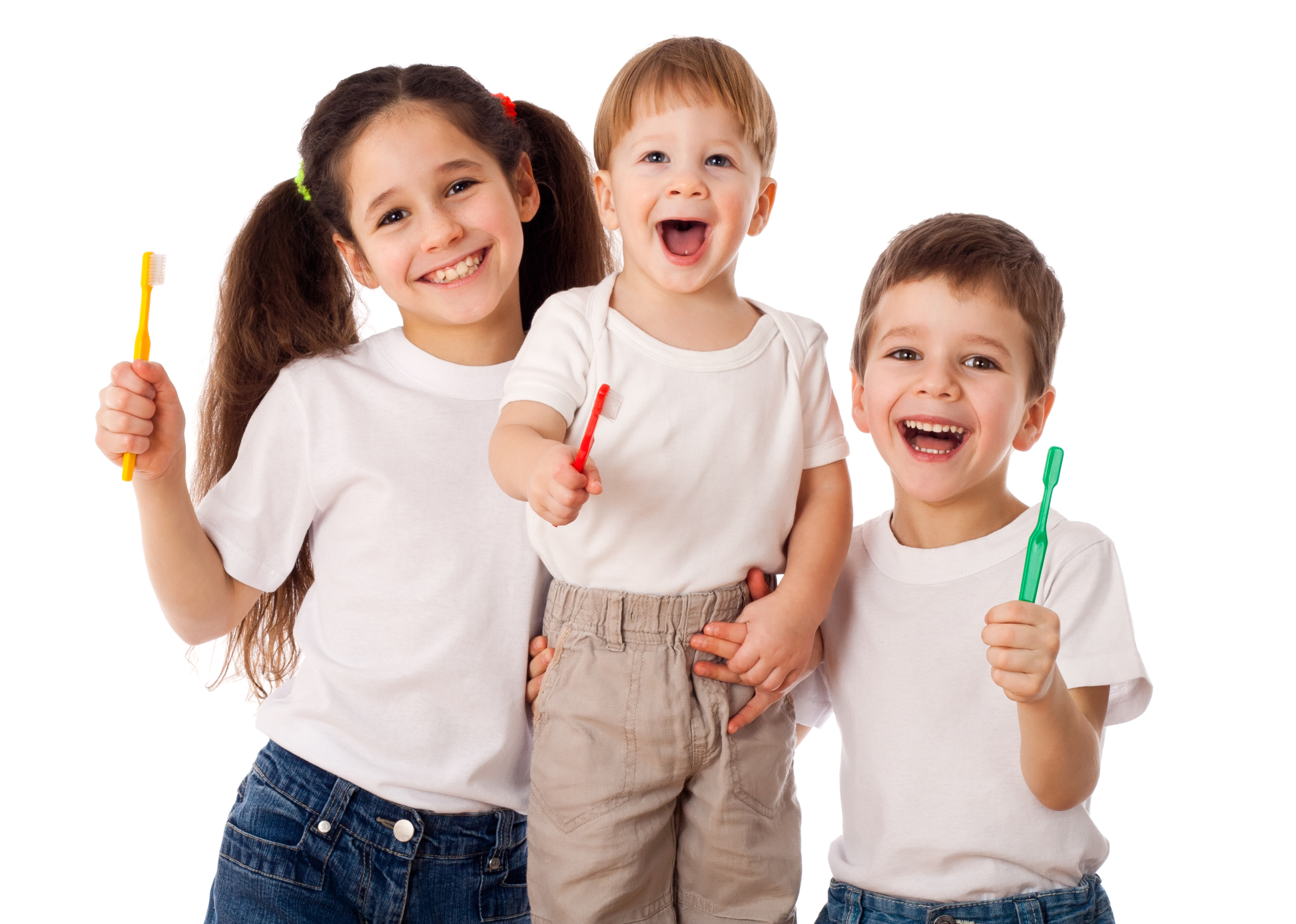 three little kids happy while holding their tooth brush